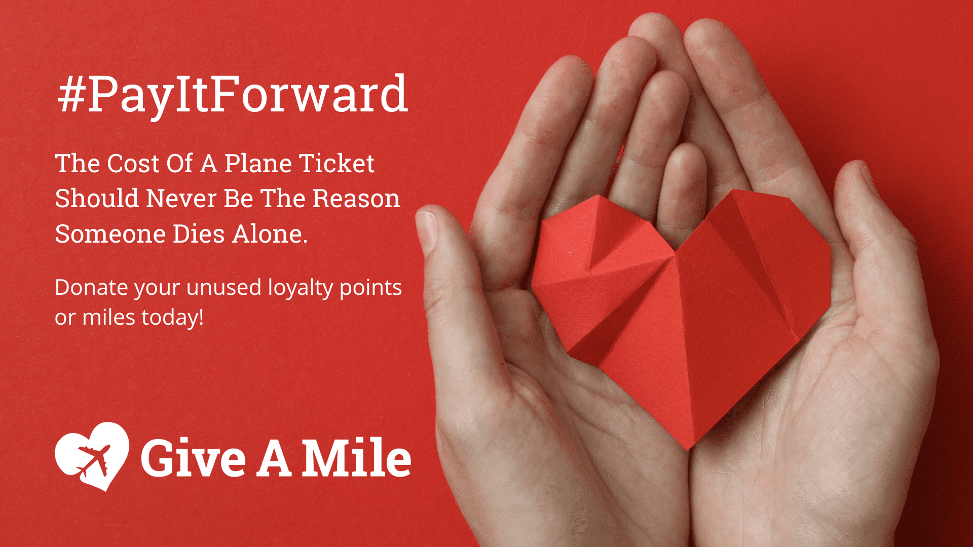 Pay It Forward - Give A Mile's Spring Fundraising Campaign. The image shows to hands holding a paper heart.